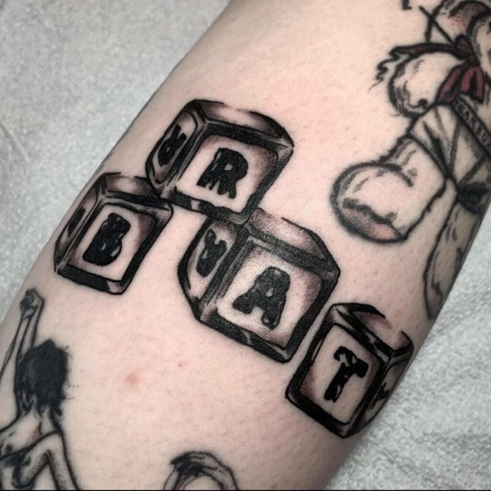 Puzzle block tattoo