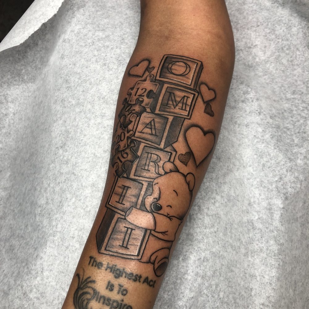 Letter block tattoo