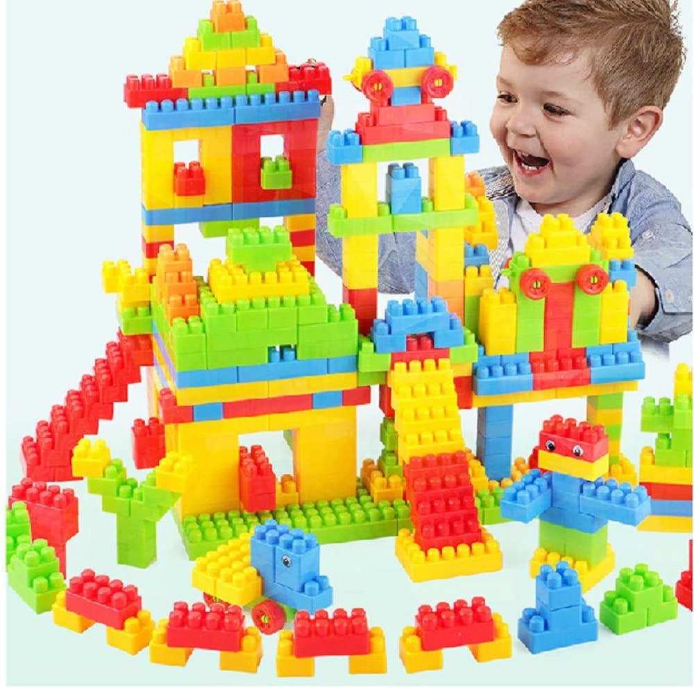 Children engaged in creative block play with colorful building blocks