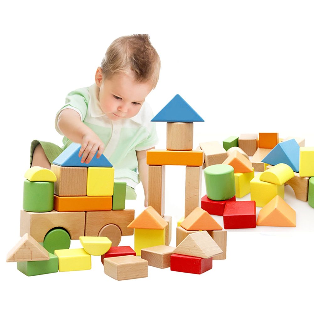 kids engaged in creative block play with blocks