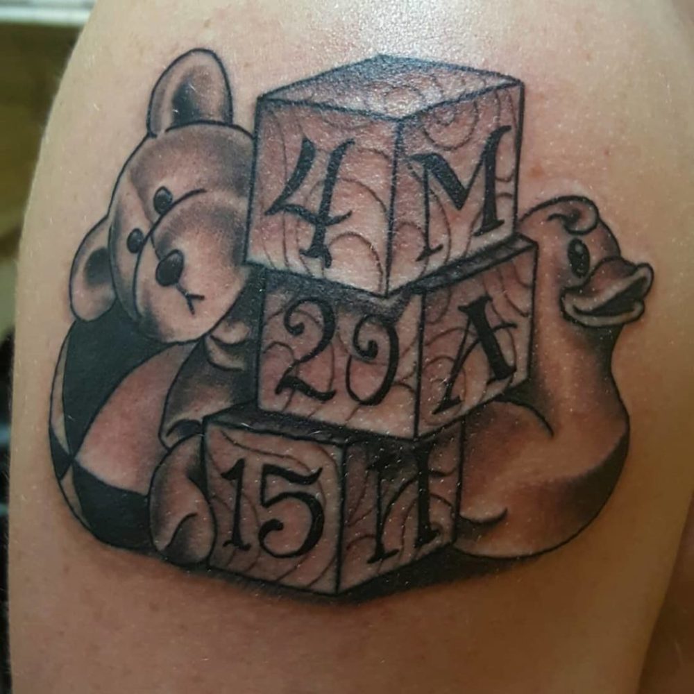 Puzzle block tattoo