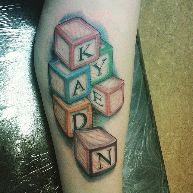 Letter block tattoo