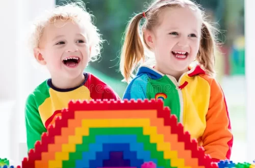 kids play with colorful building blocks