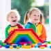 kids play with colorful building blocks