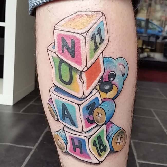 Colorful baby blocks tattoo design